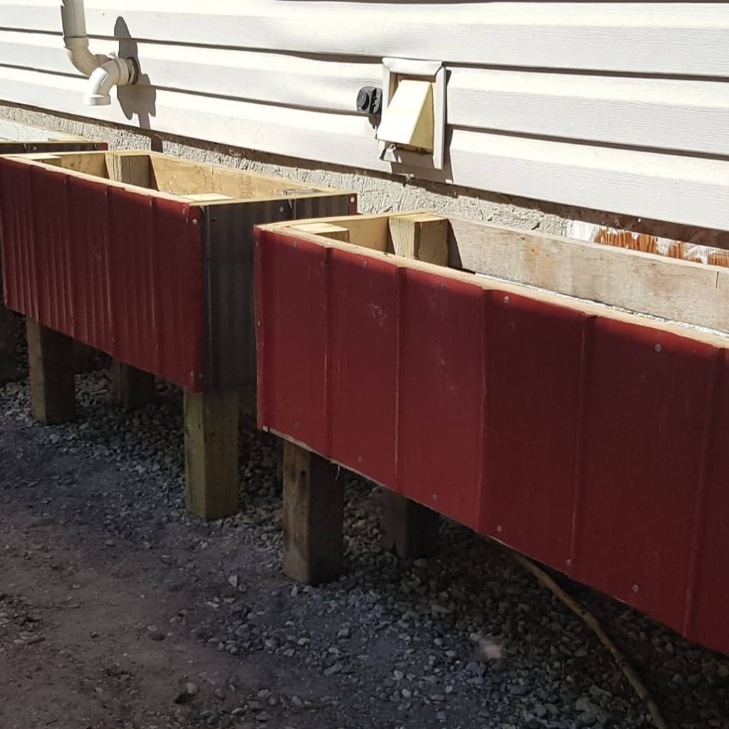 wicking beds piped together