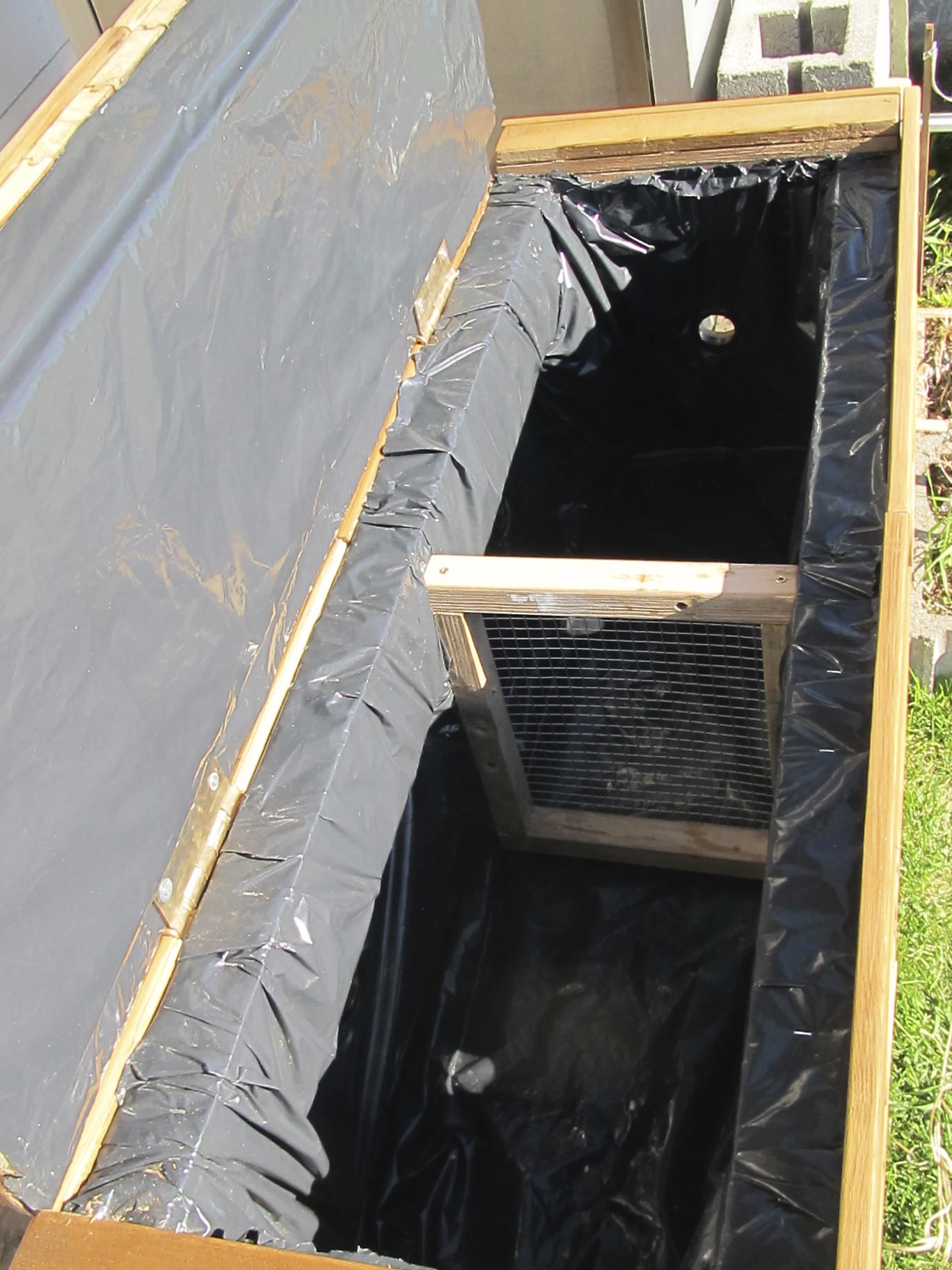 vermicomposting bins The inside is lined with a poly film to protect both the wood from moisture but also, I have heard the worms don't like cedar, so its a double purpose I guess.